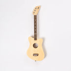 A wooden kid's guitar in natural finish.